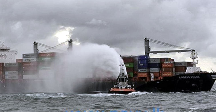Container fire erupts onboard 1